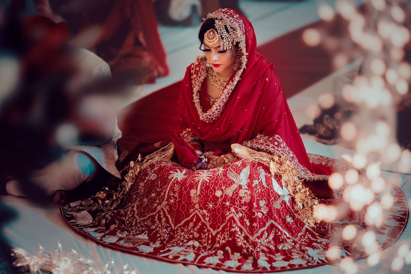Bridal dress on rent in Bahawalpur — bride in red embroidered lehenga and red veil